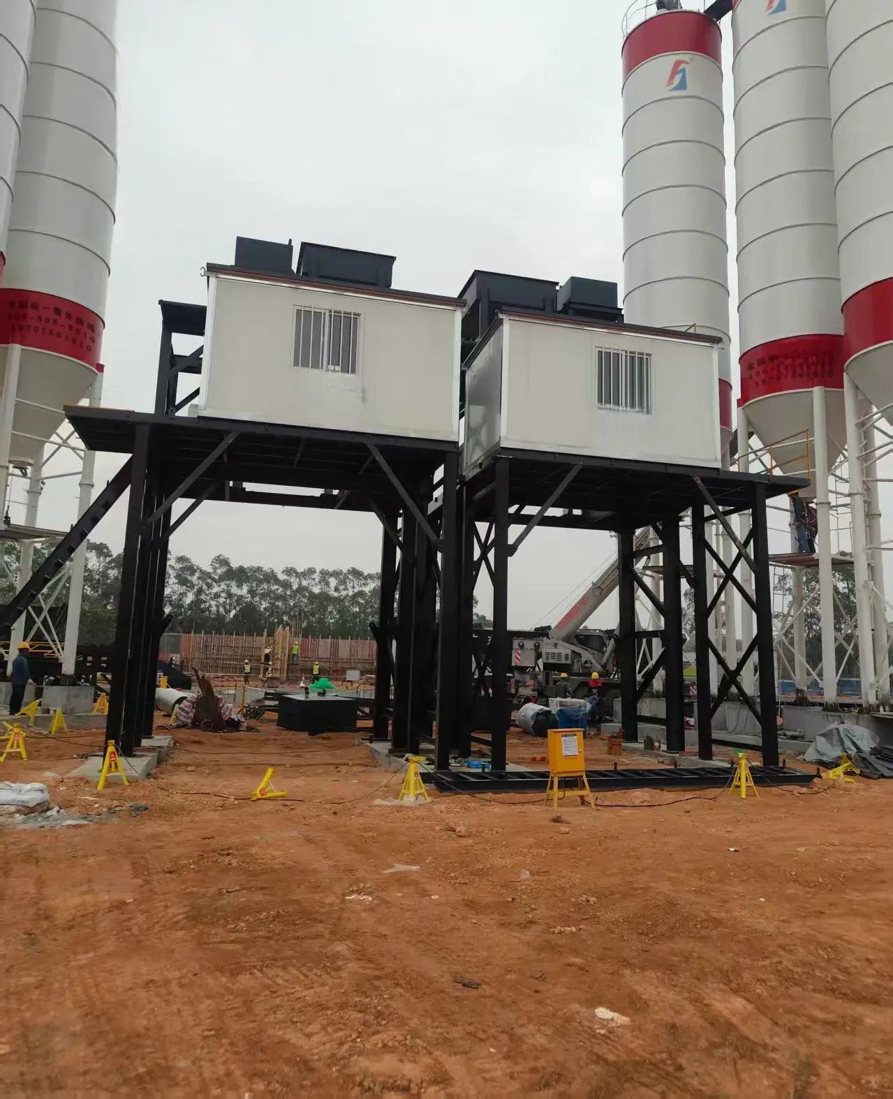 Large batching plant equipment and supporting structures, used to demonstrate equipment and structures related to large concrete batching plant system components