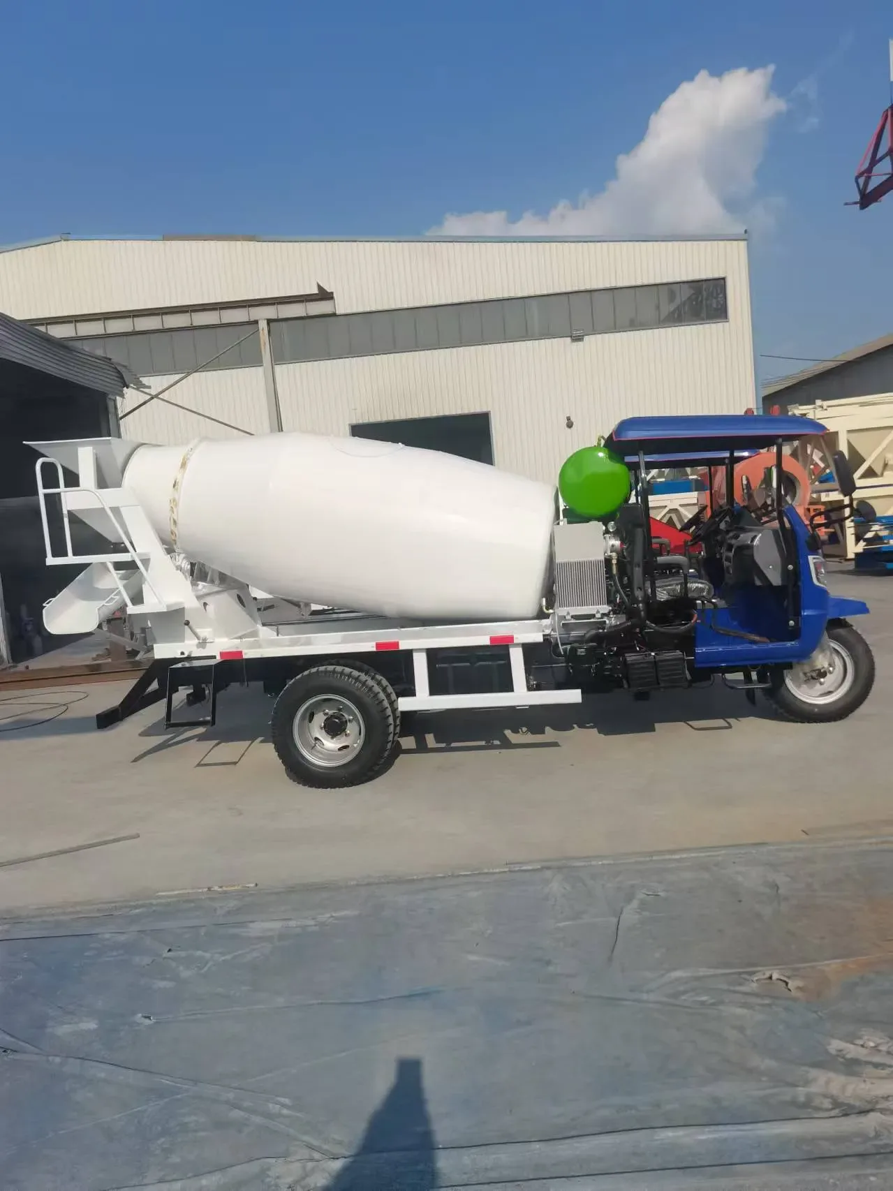 Concrete mixer truck, used to display equipment and structures related to small concrete and construction equipment.