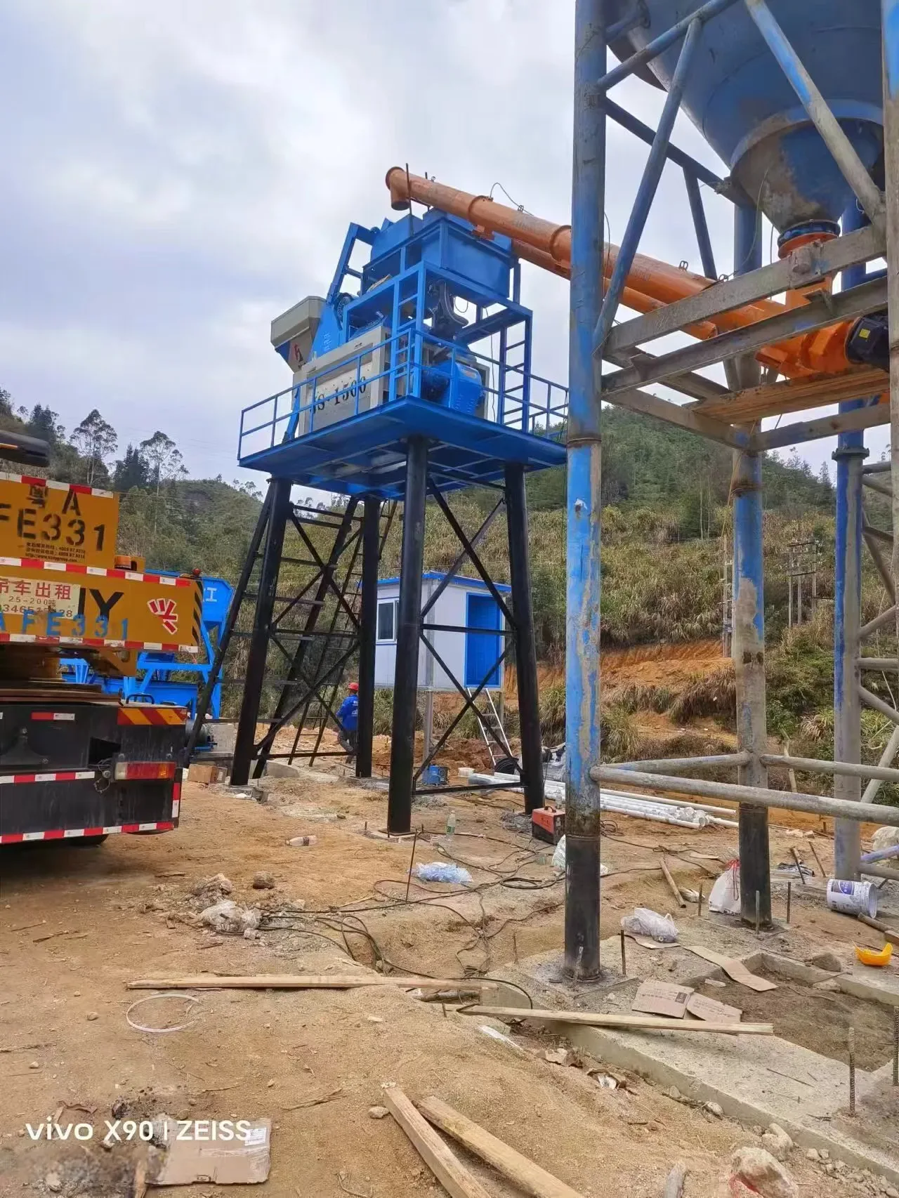 concrete equipment project site, used to display expansion and modification of existing concrete batching plant related equipment and structures