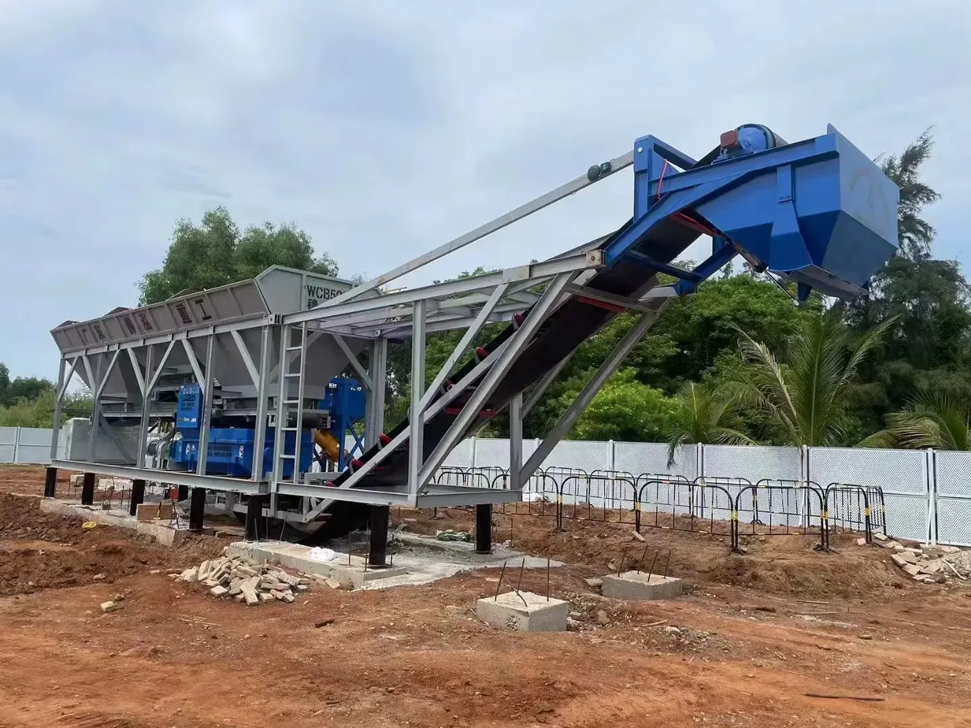 Integrated concrete mixing equipment, used to display equipment and structures related to the delivery and support of concrete equipment