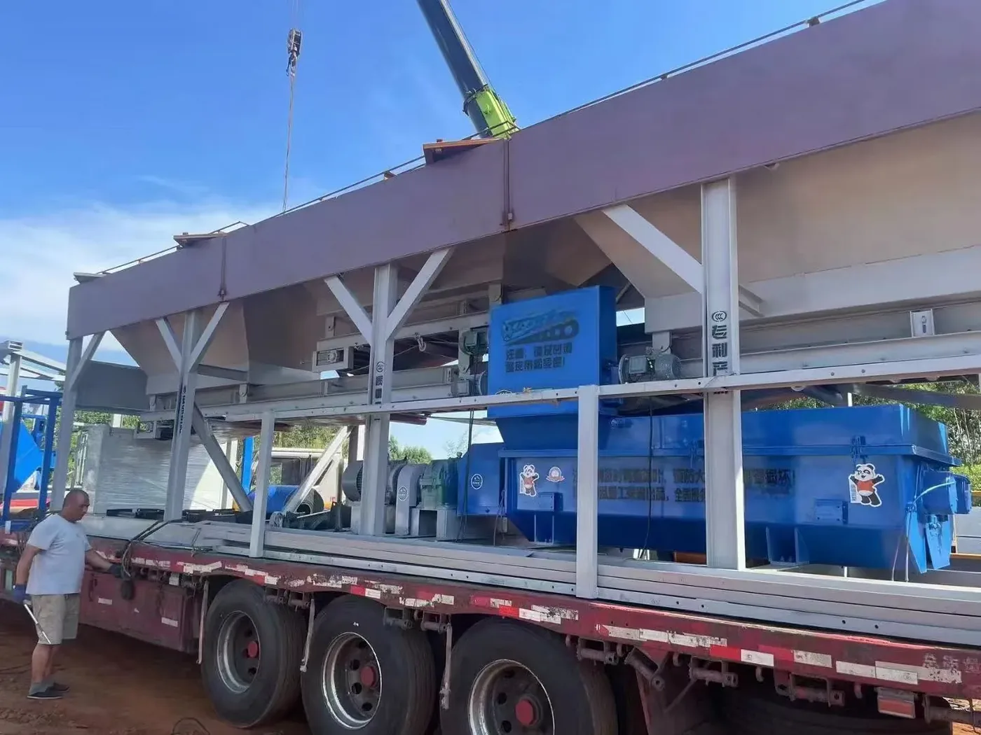 Integrated concrete mixing equipment, used to display equipment and structures related to the delivery and support of concrete equipment