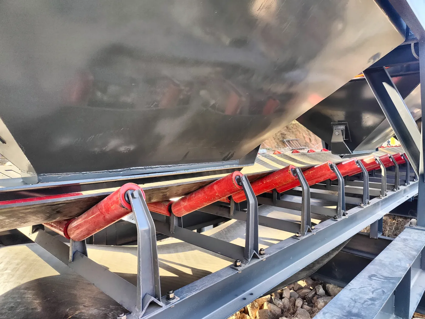 Modular batching, conveying, and mixing systems, used to display concrete batching plant solutions and project support related equipment and structures.