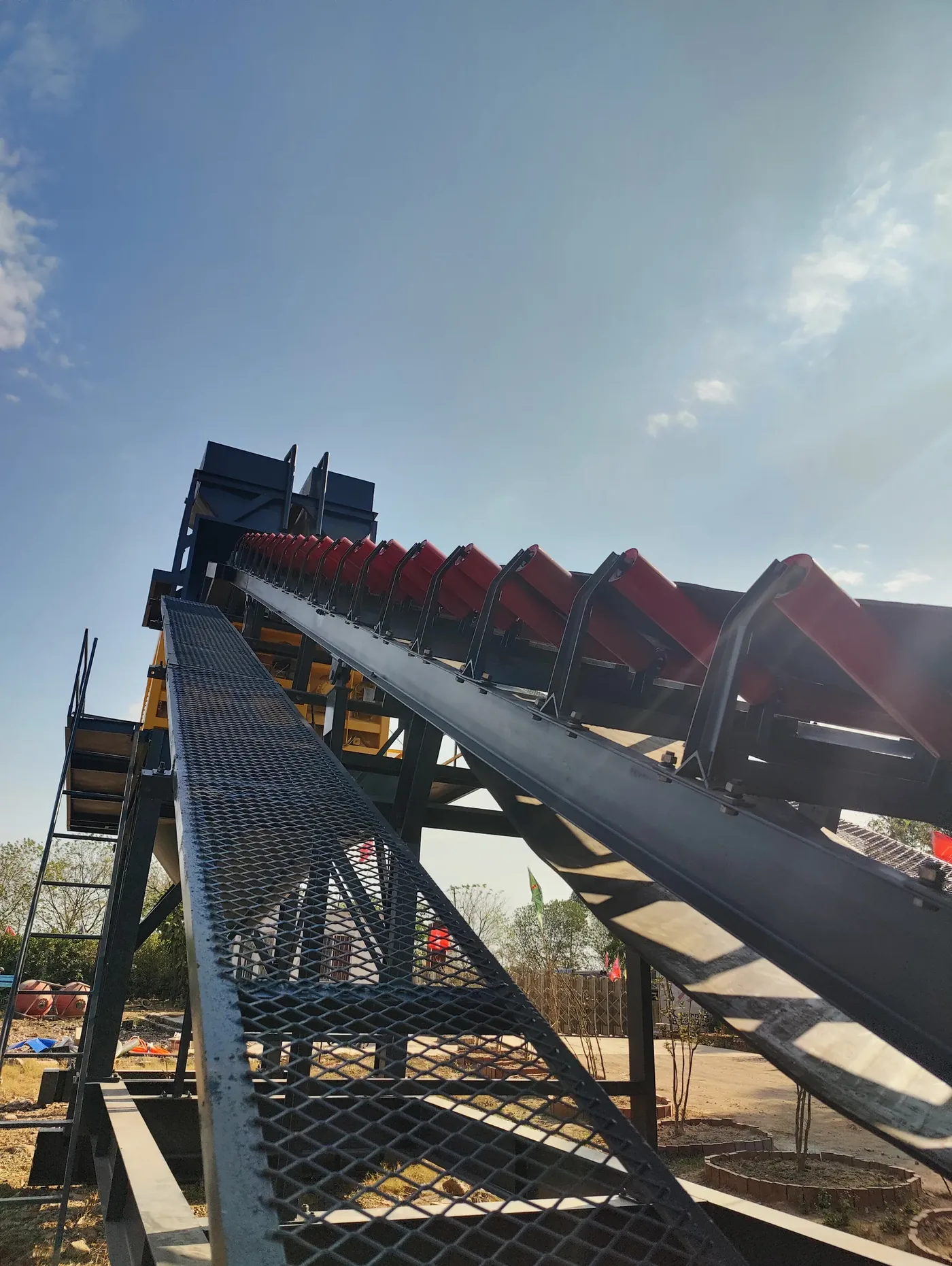 Modular batching, conveying, and mixing systems, used to display concrete batching plant solutions and project support related equipment and structures.
