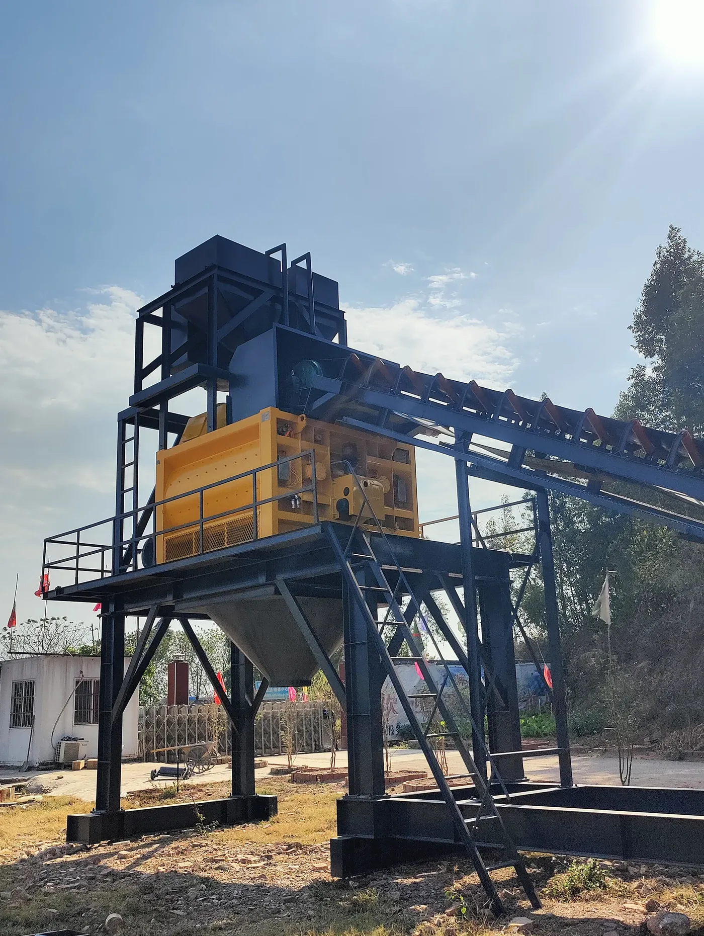 Modular batching, conveying, and mixing systems, used to display a comparison between horizontal and tower-style batching plant related equipment and structures.