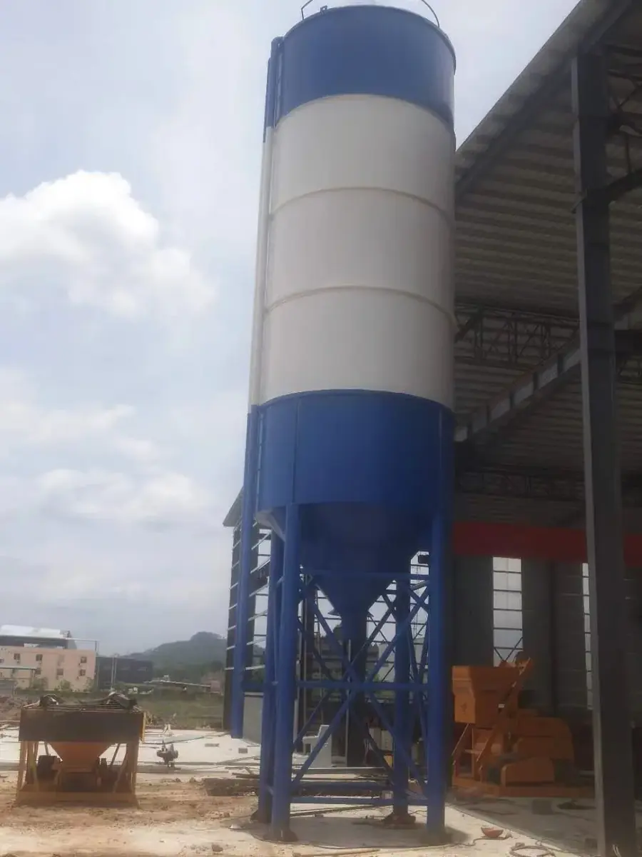 Blue-white vertical cement and powder silo silo, hopper, legs, and ladder real shots